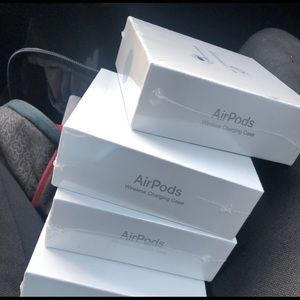 Gen 2 Air Pods. Comes w/ charger and charging case